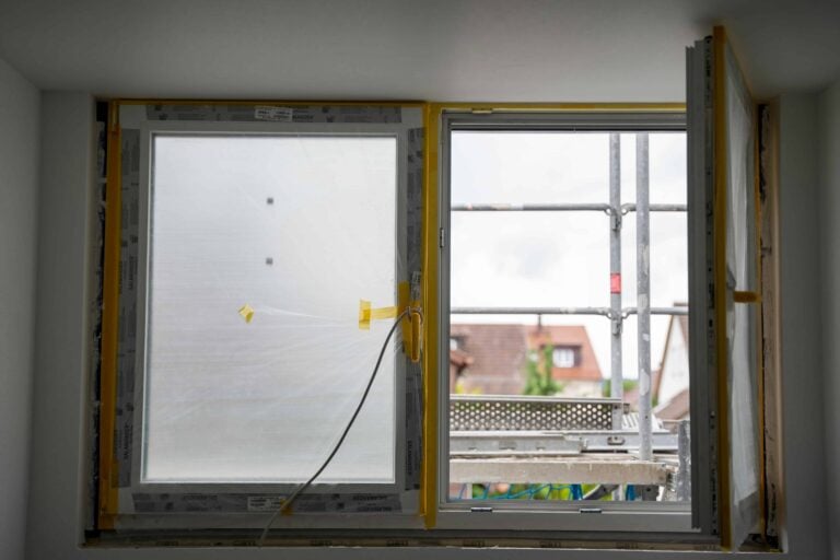 windows being installed in a home